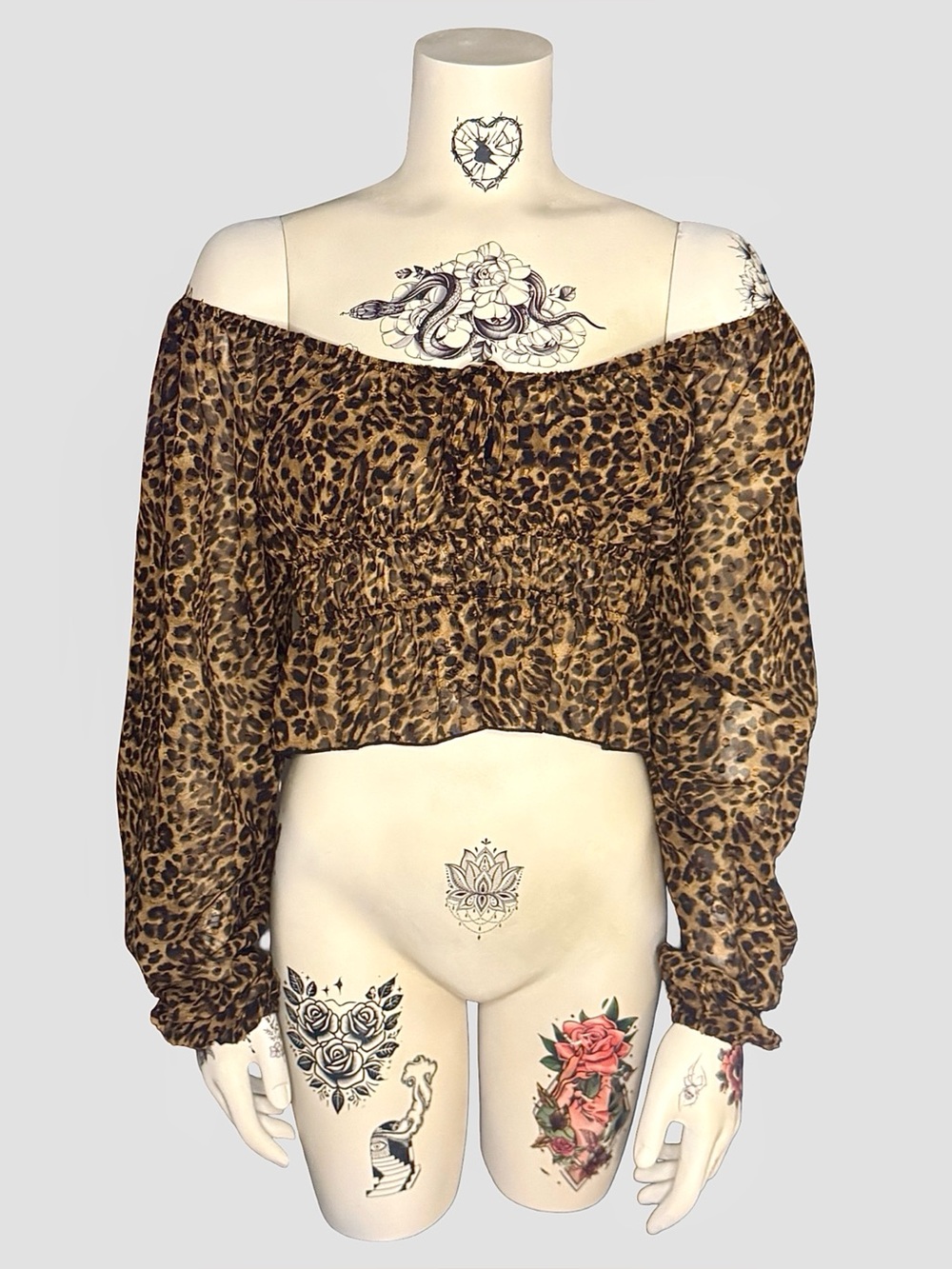 Leopard print off the shoulder long sleeve top